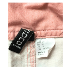 Jupe H&M fleurie rose avec zip apparent – Taille 34