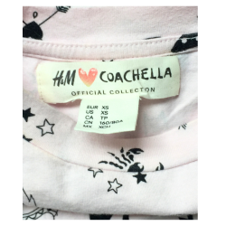 T-shirt H&M rose pâle à motifs – Taille XS
